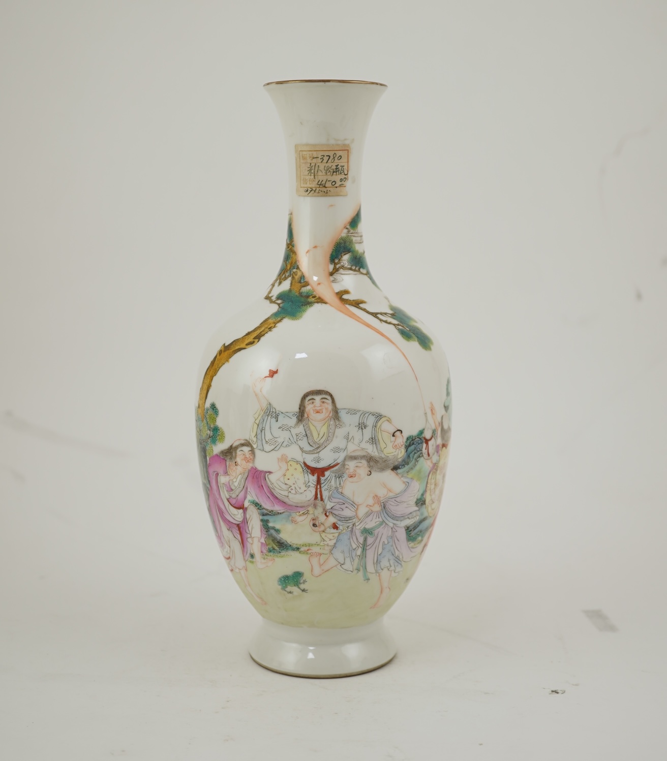 A Chinese famille rose ‘Liu Hai’ bottle vase, Qianlong six character seal mark but Republic period